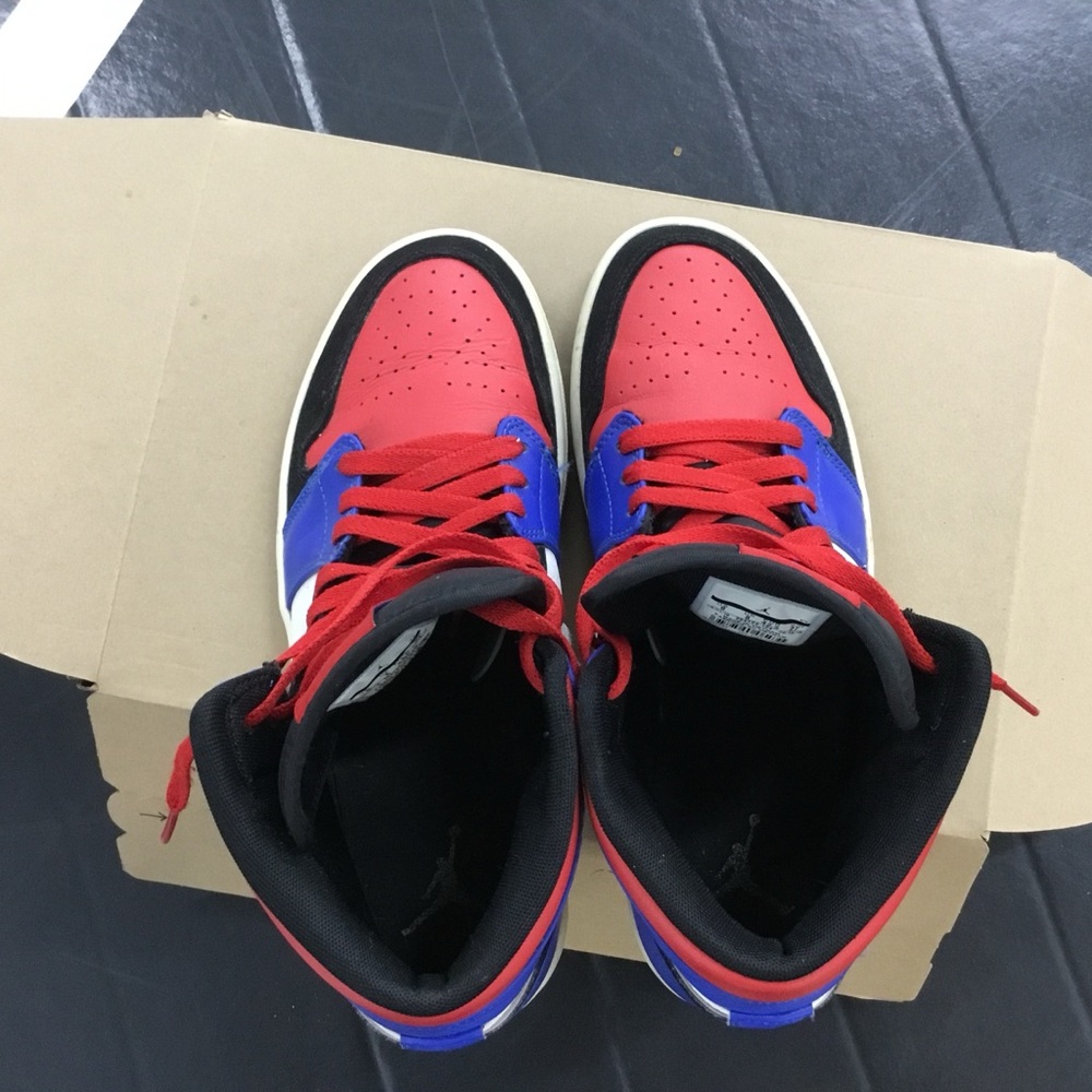 Nike Jordan 1 mids.  Red, white and blue